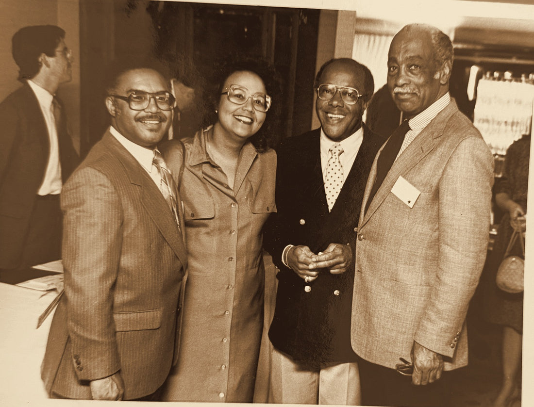 Lou Lampley with colleagues at a business event