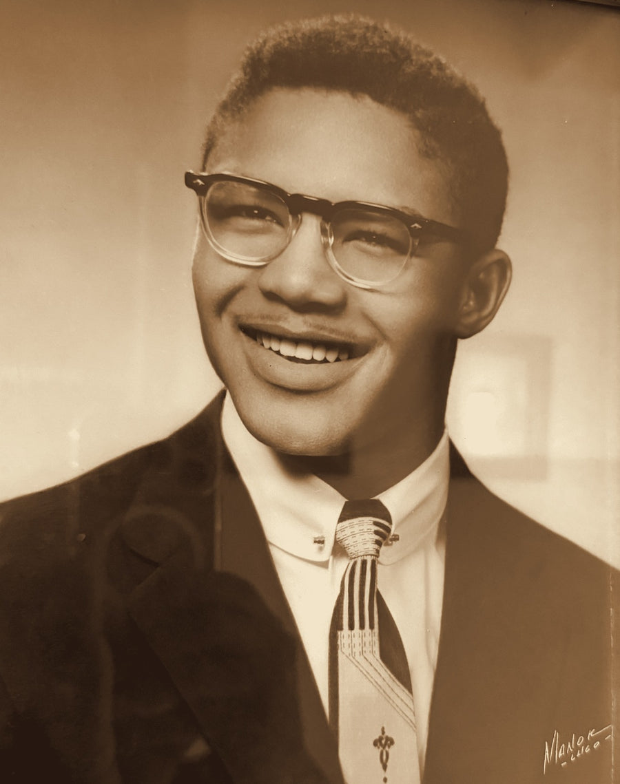 Young Lou Lampley in a suit and tie, portrait by Manor Studio, Chicago