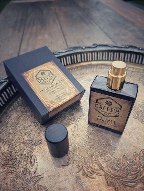 Vintage gentleman's cologne in a black and gold bottle